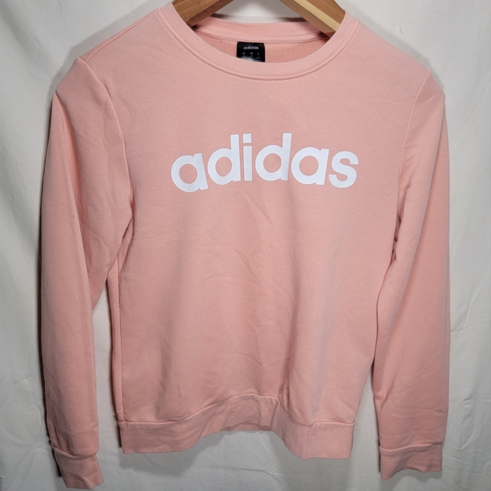 Woman's Medium Pink Adidas lightweight sweater in amazing condition really nice.